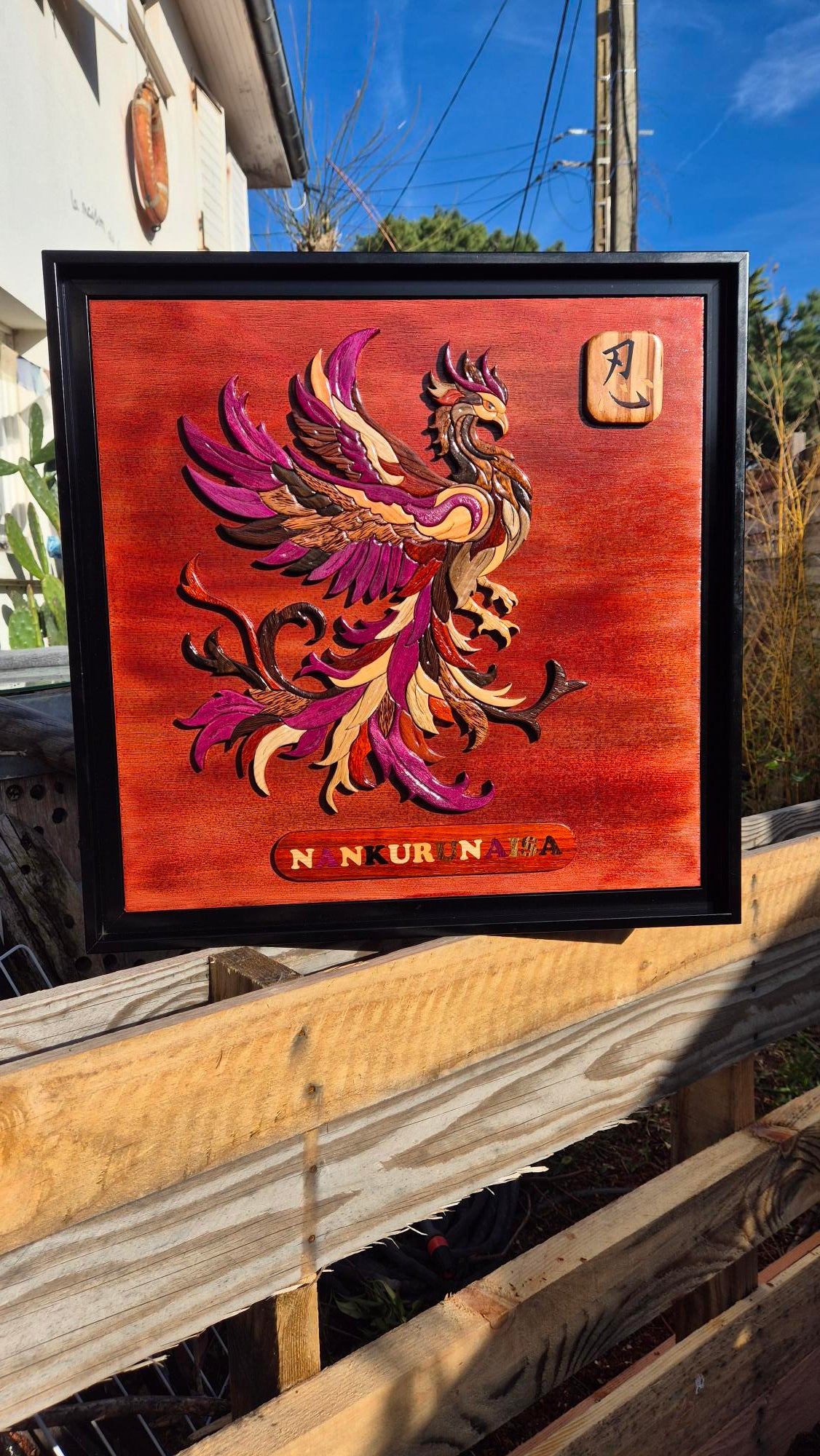 Art de l'intarsia "Le Phoenix Nankurunaisa"
